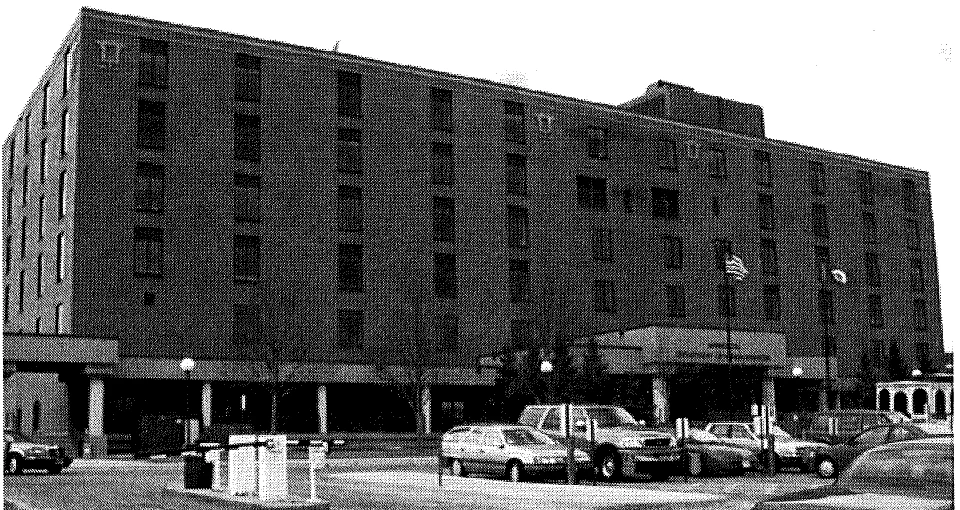 Archival black-and-white photograph of the DHS building at 444 Lafayette Road North in 1998