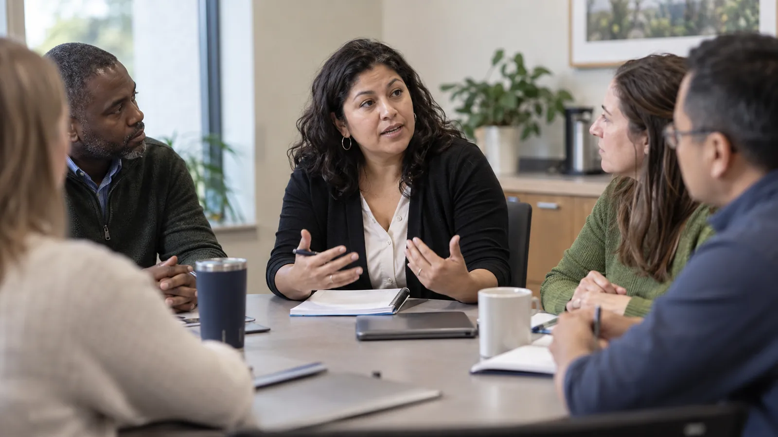 A facilitator leads a careful group conversation.